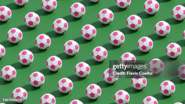 women's soccer illustration with pink and white soccer balls - frauenfußball stock-fotos und bilder