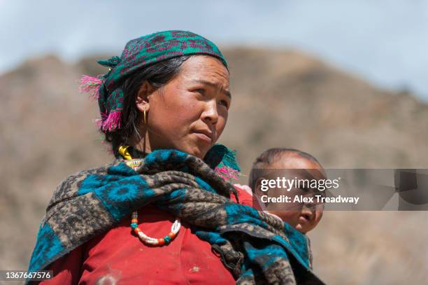 mother and baby from dolpo - nepal women stock pictures, royalty-free photos & images
