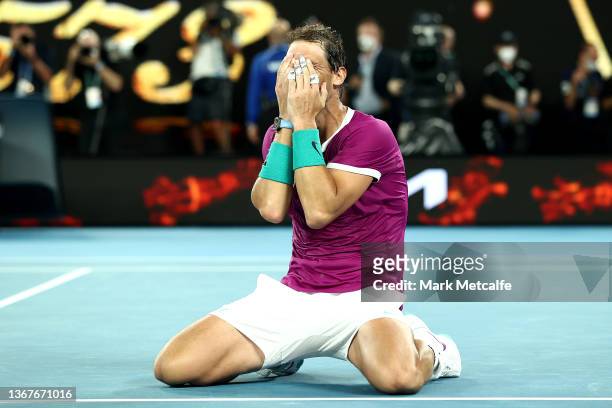 Rafael Nadal of Spain celebrates match point in his Men’s Singles Final match against Daniil Medvedev of Russia during day 14 of the 2022 Australian...