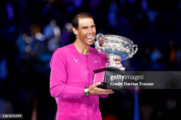 Rafael Nadal of Spain poses with the Norman Brookes Challenge Cup as he celebrates victory in his Men’s Singles Final match against Daniil Medvedev...