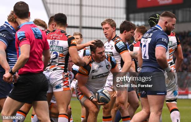 Tigers hooker Julian Montoya is congratulated by team mates after scoring the opening tr during the Gallagher Premiership Rugby match between Sale...