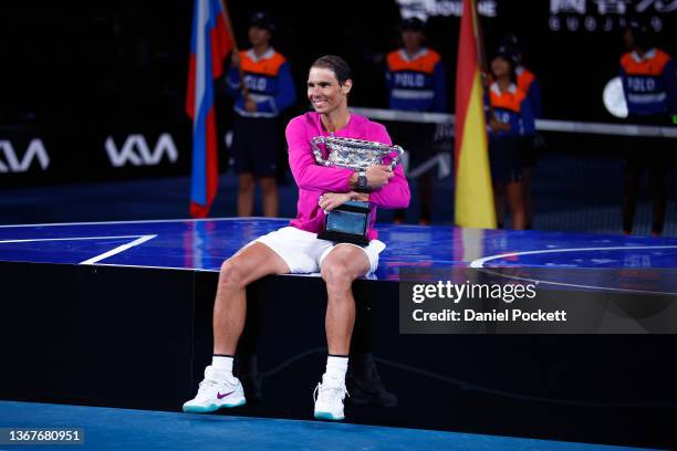 Rafael Nadal of Spain poses with the Norman Brookes Challenge Cup as he celebrates victory in his Men’s Singles Final match against Daniil Medvedev...