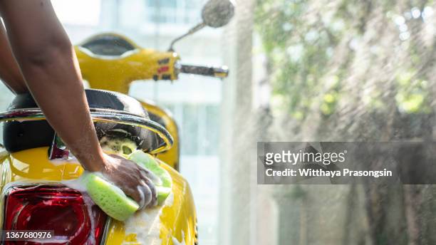 wash the motorcycle - motorbike wash stock pictures, royalty-free photos & images