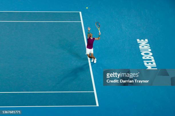 Rafael Nadal of Spain serves in his Men's Singles Final match against Daniil Medvedev of Russia during day 14 of the 2022 Australian Open at...