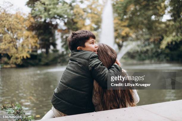 happy boy and girl spend time together. - tomber amoureux photos et images de collection
