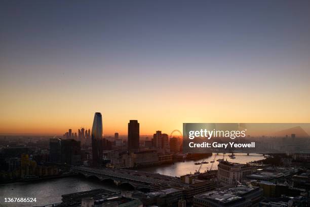 london city skyline and river thames at sunset - sunset stock pictures, royalty-free photos & images