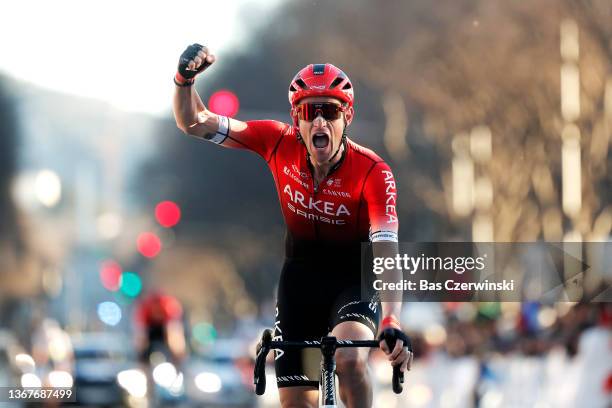 Maxime Bouet of France and Team Arkea - Samsic celebrates at finish line the victory of his teammate Amaury Capiot of Belgium and Team Arkea - Samsic...