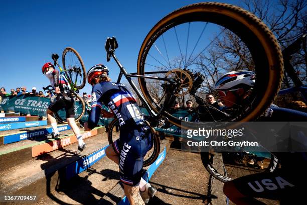 Matthias Schwarzbacher of Slovakia, Louka Lesueur of France and Magnus White of The United States compete during the 73rd UCI Cyclo-Cross World...