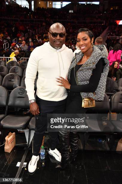 Simon Guobadia and Porsha Williams attend the game between the Los Angeles Lakers and the Atlanta Hawks at State Farm Arena on January 30, 2022 in...