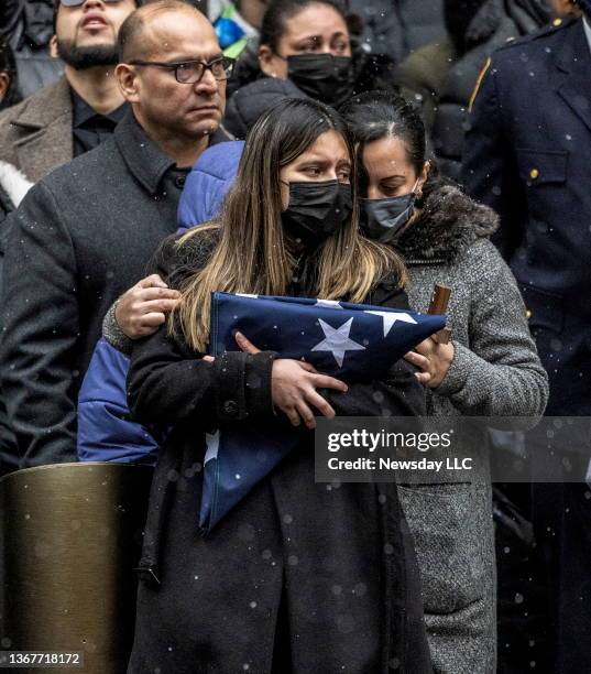 Dominique Luzuriaga, widow of, NYPD Officer Jason Rivera, during Rivera's funeral outside St. Patrick's Cathedral, Friday, Jan. 28 in New York....