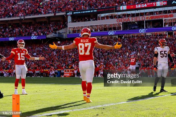 Tight end Travis Kelce of the Kansas City Chiefs celebrates with quarterback Patrick Mahomes after catching a second quarter touchdown pass against...