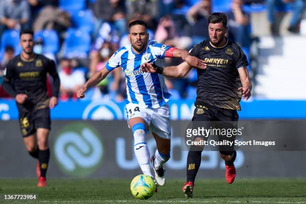 Recio of CD Leganes battle for the ball with Borja Valle of AD Alcorcon during the LaLiga Smartbank match between CD Leganes and AD Alcorcon at...