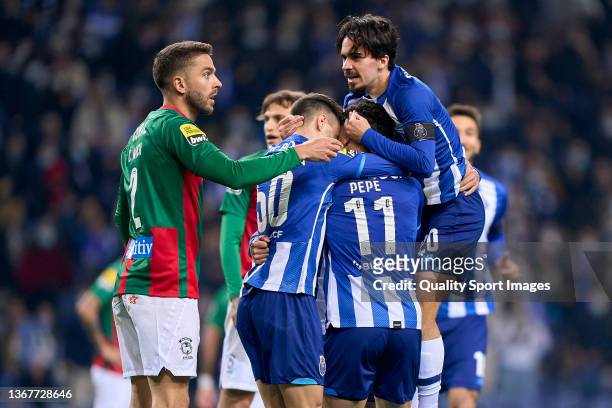 Eduardo Aquino 'Pepe' of FC Porto celebrates with his team mates after scoring their side's second goal during the Liga Portugal Bwin match between...