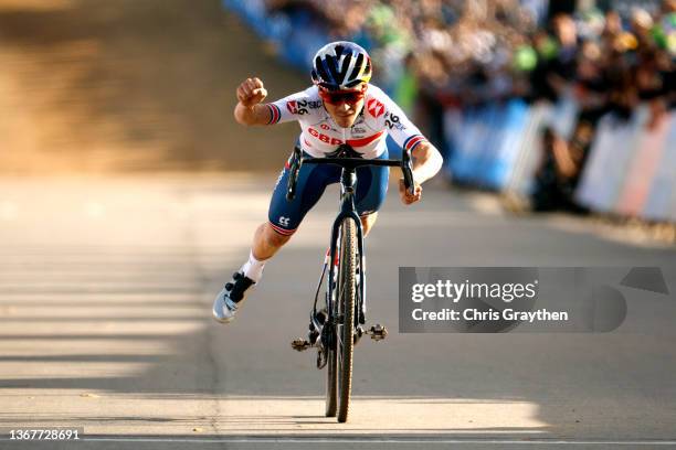 Thomas Pidcock of The United Kingdom celebrates his victory by doing the superman pose during the 73rd UCI Cyclo-Cross World Championships...