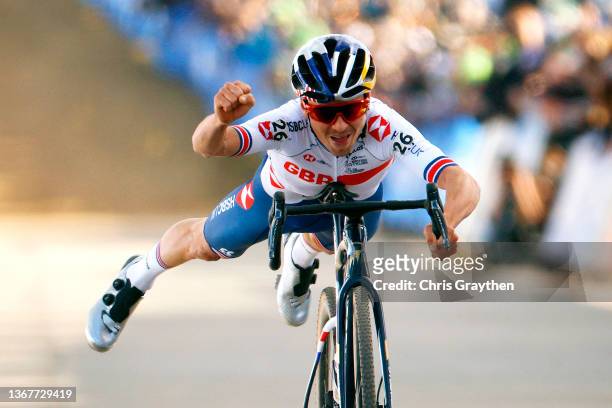Thomas Pidcock of The United Kingdom celebrates his victory by doing the superman pose during the 73rd UCI Cyclo-Cross World Championships...