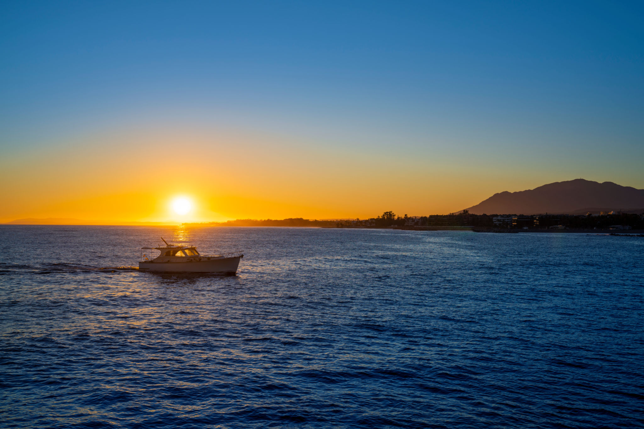 Puerto Banus in Marbella marina harbor at sunset in Costa del So Puerto Banus in Marbella marina harbor at sunset in Costa del So