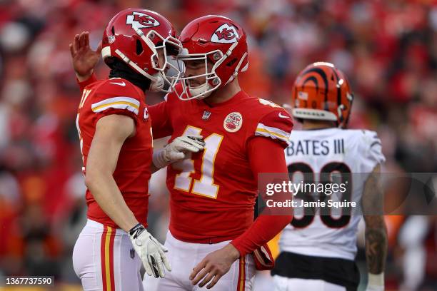 Kicker Harrison Butker of the Kansas City Chiefs celebrates with long snapper James Winchester after tying the game against the Cincinnati Bengals at...