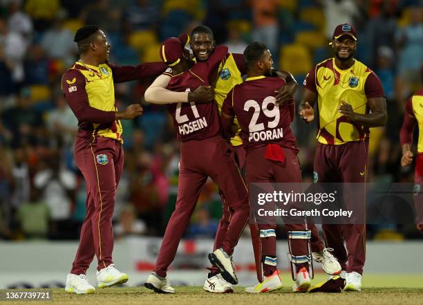 Jason Holder of the West Indies celebrates dismissing Saqib Mahmood of England during the 5th T20 International match between West Indies and England...