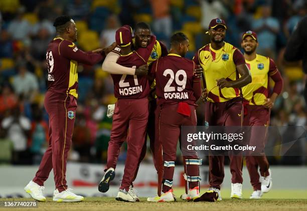 Jason Holder of the West Indies celebrates dismissing Saqib Mahmood of England during the 5th T20 International match between West Indies and England...
