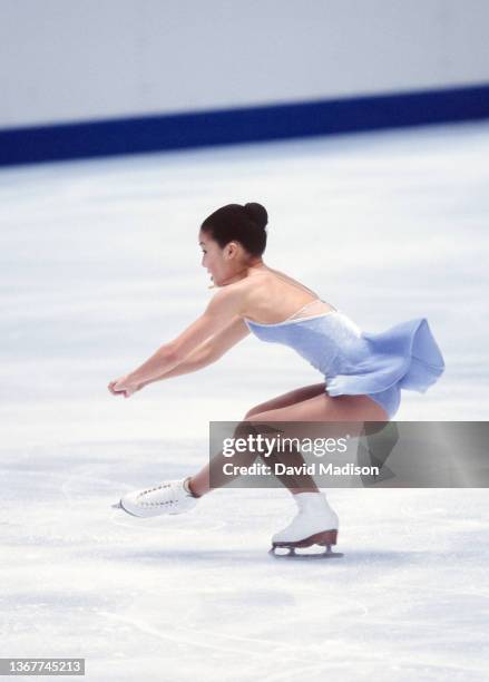 Michelle Kwan of the USA skates her free program in the Ladies Singles event of the figure skating competition in the 1998 Winter Olympics held on...