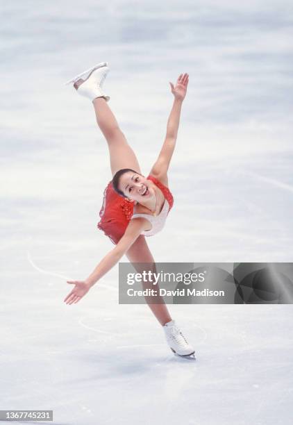 Michelle Kwan of the USA skates her short program in the Ladies Singles event of the figure skating competition in the 1998 Winter Olympics held on...