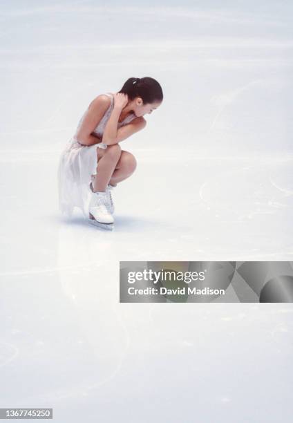 Michelle Kwan of the USA skates in the exhibition program of the figure skating competition in the 1998 Winter Olympics held on February 21, 1998 in...