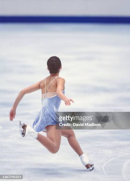 Michelle Kwan of the USA skates her free program in the Ladies Singles event of the figure skating competition in the 1998 Winter Olympics held on...