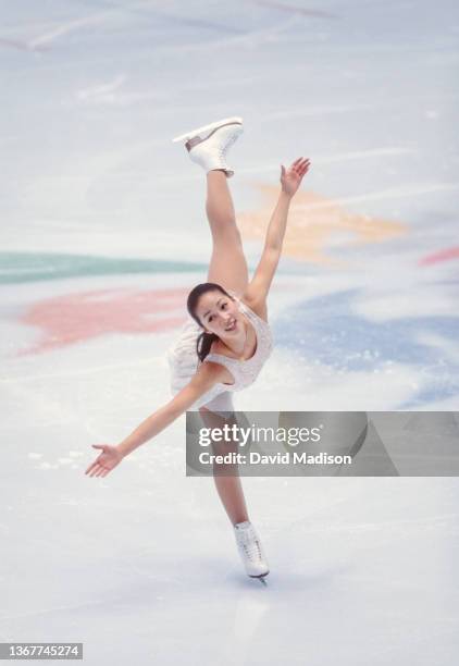 Michelle Kwan of the USA skates in the exhibition program of the figure skating competition in the 1998 Winter Olympics held on February 21, 1998 in...