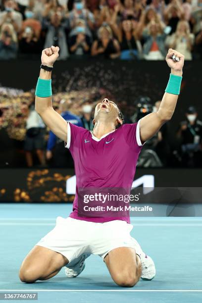 Rafael Nadal of Spain celebrates match point in his Men’s Singles Final match against Daniil Medvedev of Russia during day 14 of the 2022 Australian...