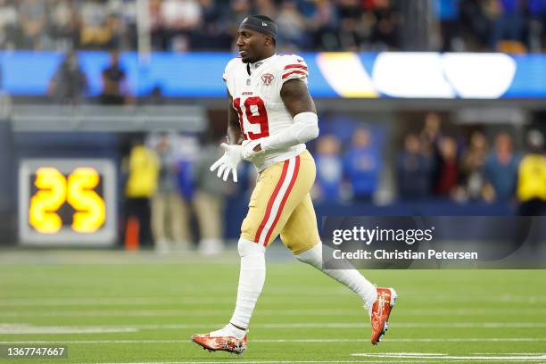 Deebo Samuel of the San Francisco 49ers leaves the field after being hit after a catch in the second quarter against the Los Angeles Rams in the NFC...