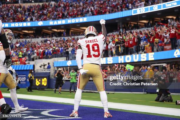 Deebo Samuel of the San Francisco 49ers reacts after scoring a touchdown in the second quarter against the Los Angeles Rams in the NFC Championship...