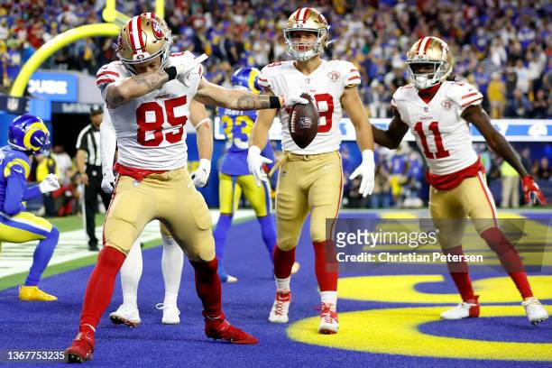 George Kittle of the San Francisco 49ers reacts after catching a 16 yard touchdown in the third quarter against the Los Angeles Rams in the NFC...