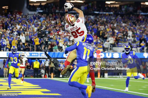 George Kittle of the San Francisco 49ers catches a 16 yard touchdown in the third quarter against Darious Williams of the Los Angeles Rams in the NFC...