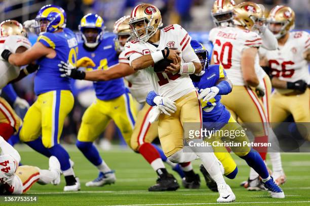 Obo Okoronkwo of the Los Angeles Rams pressures Jimmy Garoppolo of the San Francisco 49ers in the third quarter during the NFC Championship Game at...