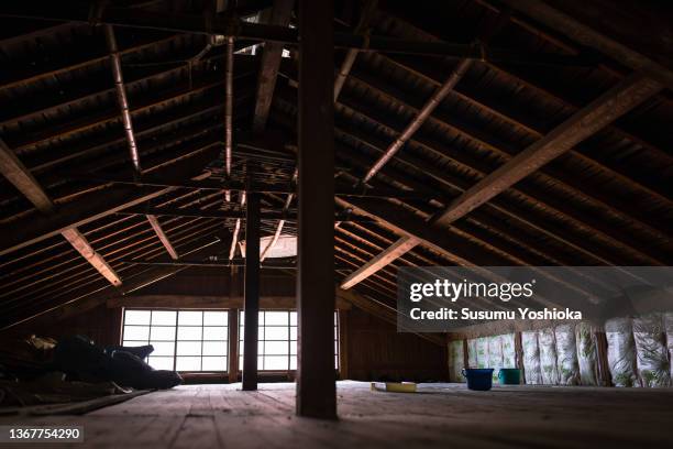 men renovating an old house in rural japan. - loft stock pictures, royalty-free photos & images