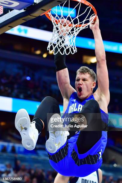 Moritz Wagner of the Orlando Magic reacts after dunking in the second half against the Dallas Mavericks at Amway Center on January 30, 2022 in...