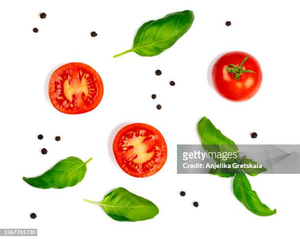 fresh tomato, herbs and spices isolated on white background, top view. - tomaten stockfoto's en -beelden