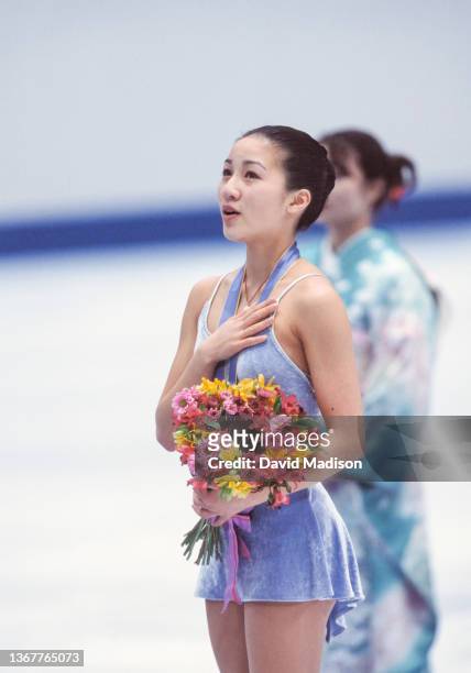 Michelle Kwan of the USA takes part in the medal ceremony of the Ladies Singles event of the figure skating competition in the 1998 Winter Olympics...