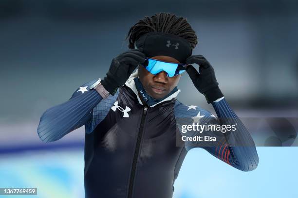 Erin Jackson of Team United States adjusts her glasses during a speed skating practice session ahead of the Beijing 2022 Winter Olympic Games at...