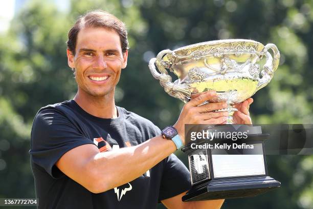 Rafael Nadal of Spain poses with the Norman Brookes Challenge Cup after winning last nights 2022 Australian Open Men's Singles Final, at Government...