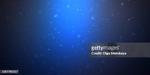 small particles in a light beam - underwater texture stock pictures, royalty-free photos & images