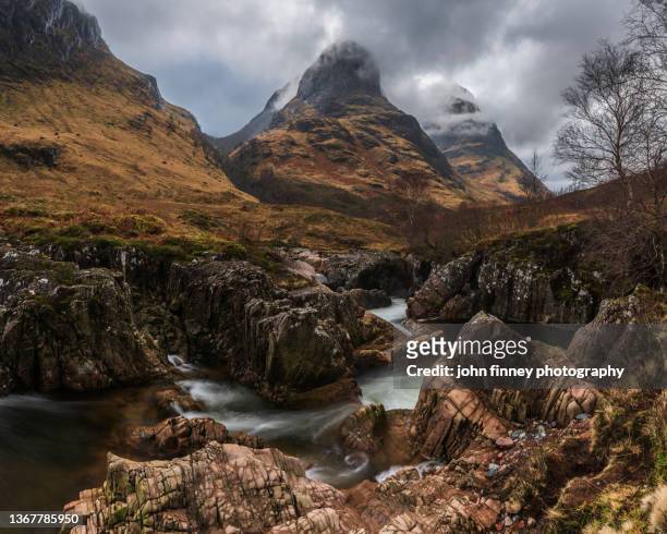 three sisters of glen coe, scottish highlands uk - glencoe scotland stock pictures, royalty-free photos & images