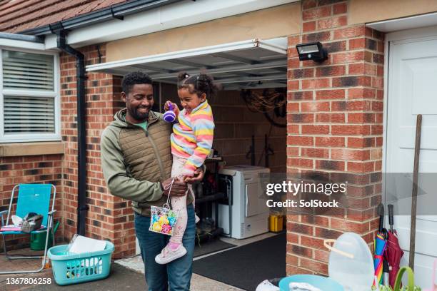 easter community shopping - easter egg hunt outside stock pictures, royalty-free photos & images