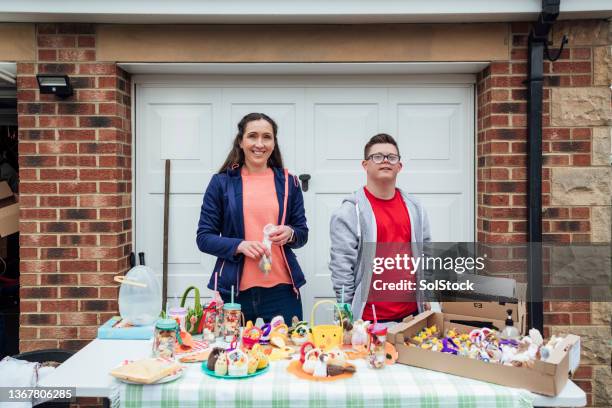 mother and son easter yard sale - spring fete stock pictures, royalty-free photos & images