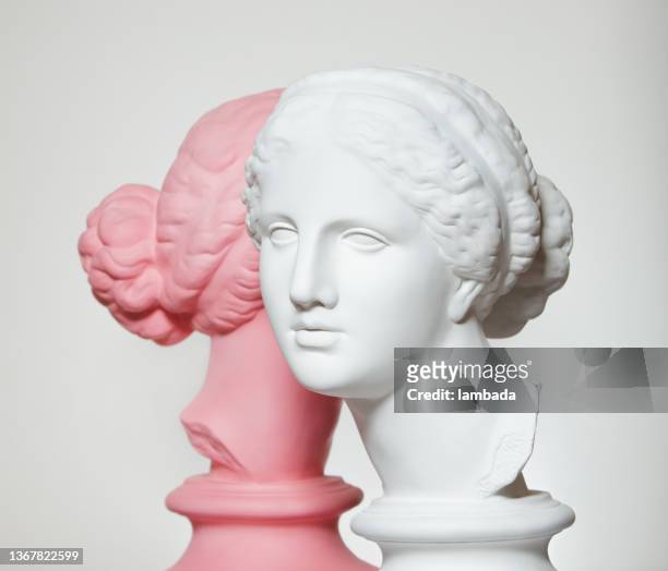 white and pink colored busts of greek goddesses - anthropomorphic face stock pictures, royalty-free photos & images