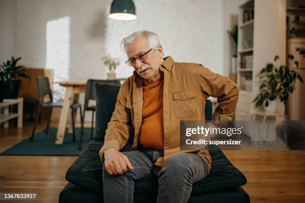 senior men having back pain - human kidney stock pictures, royalty-free photos & images