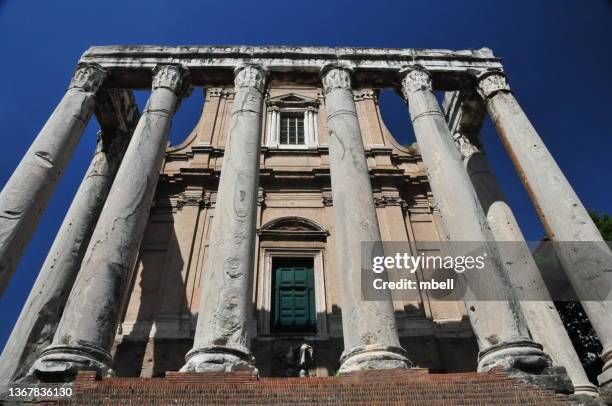 church of san lorenzo within the temple ruins temple of antoninus and faustina church san lorenzo in miranda in rome italy - faustina temple stock pictures, royalty-free photos & images