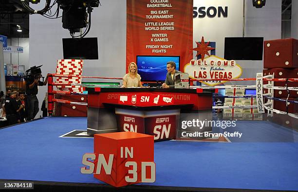 Sports reporter and host Michelle Beadle and sports radio personality Colin Cowherd broadcast "SportsNation" in 3D from the ESPN 3D section at The...