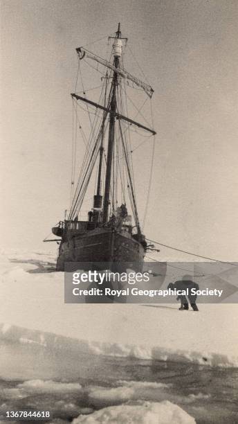 'Quest' beset by ice; James Marr in foreground, during the Shackleton-Rowett Antarctic Expedition 1921-1922 'Quest'.