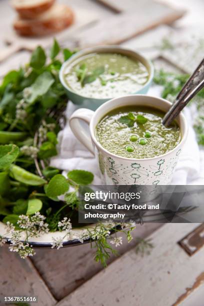 green pea soup - pea and mint soup stock pictures, royalty-free photos & images